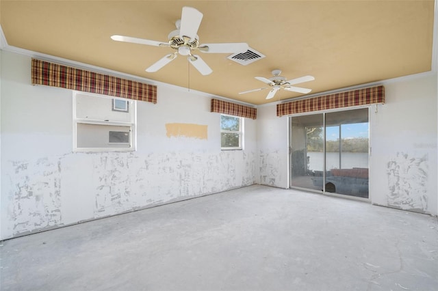 empty room with ornamental molding, a ceiling fan, visible vents, and unfinished concrete floors