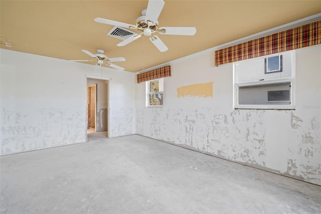 spare room featuring concrete flooring and ceiling fan