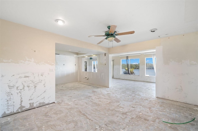 empty room with a ceiling fan