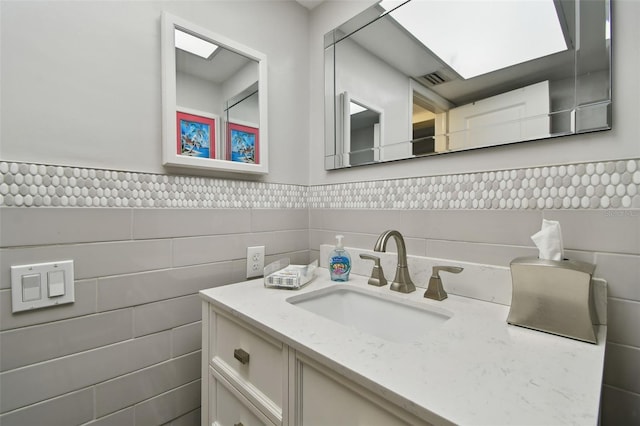 3717 46th Ave S Unit 7, Saint Petersburg, FL 33711 - bathroom with tile walls and vanity