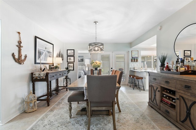 dining space featuring french doors