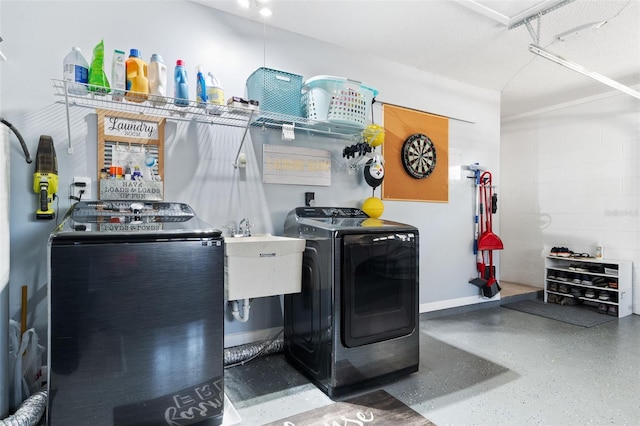 laundry area with laundry area and independent washer and dryer