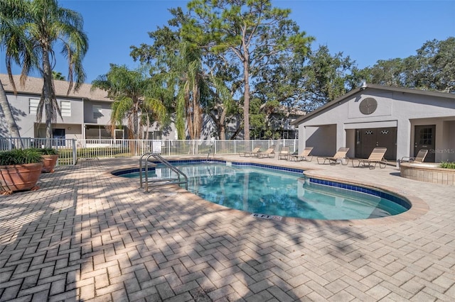 view of pool featuring a patio area