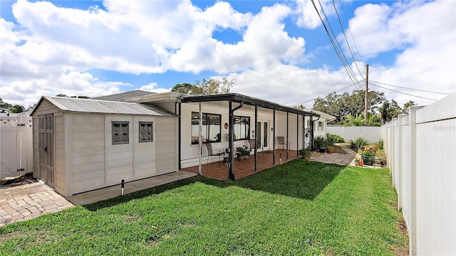 view of yard with a patio area and a fenced backyard