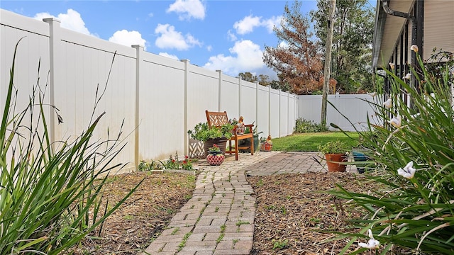 view of yard featuring a fenced backyard and a patio