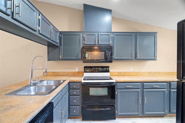 kitchen with blue cabinetry, a sink, black appliances, light countertops, and vaulted ceiling