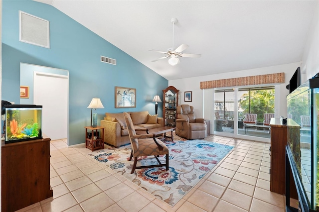 living room featuring light tile patterned floors, ceiling fan, visible vents, and high vaulted ceiling