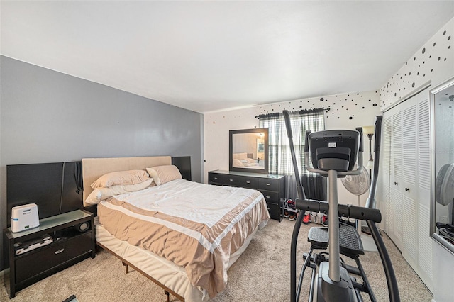 bedroom with light colored carpet