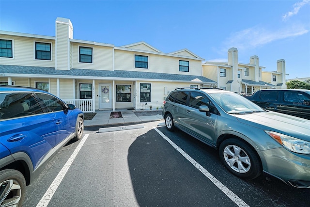 view of front of property with uncovered parking