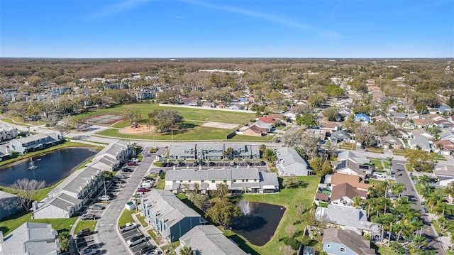 aerial view featuring a residential view and a water view