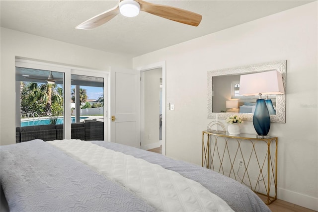 bedroom featuring ceiling fan, wood finished floors, baseboards, and access to outside