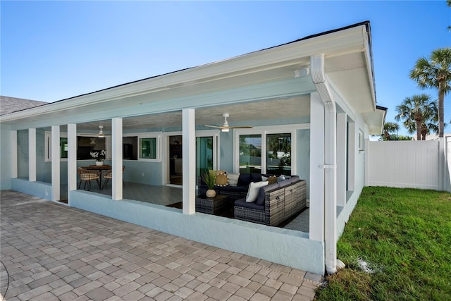 view of patio / terrace featuring fence and an outdoor hangout area