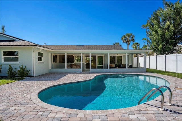 view of swimming pool with a patio area, a fenced in pool, and a fenced backyard