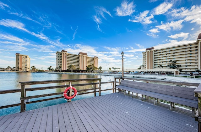 dock area with a water view and a city view