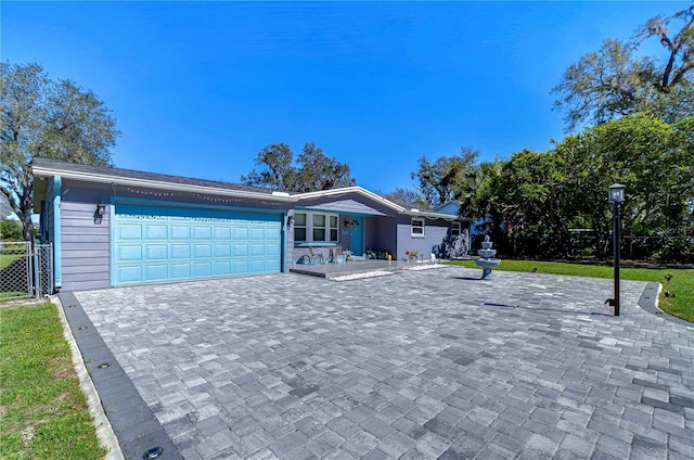 ranch-style house with a garage