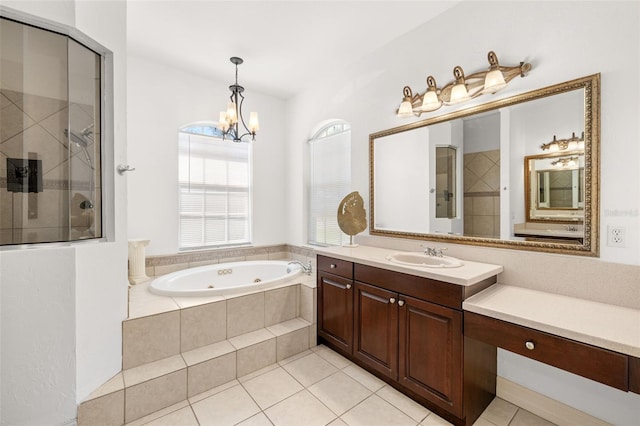 bathroom with separate shower and tub, tile patterned flooring, a chandelier, and vanity