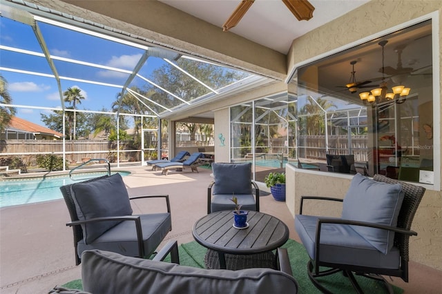 view of patio / terrace featuring an outdoor hangout area, a lanai, and a fenced in pool