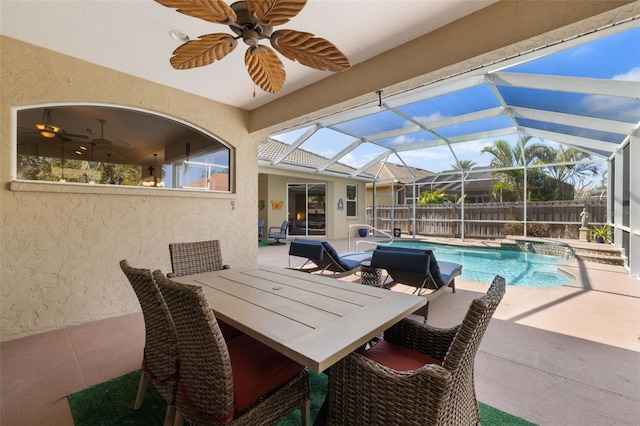 view of swimming pool featuring a patio and a lanai