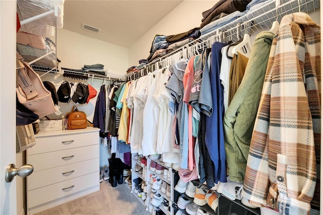 spacious closet featuring carpet and visible vents