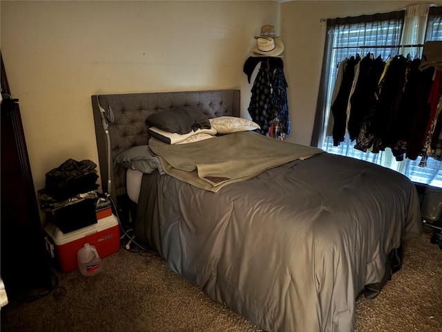 bedroom featuring carpet