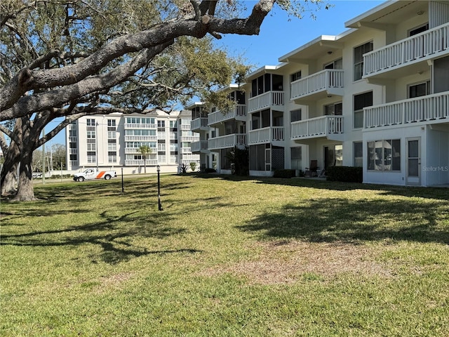 view of community featuring a yard