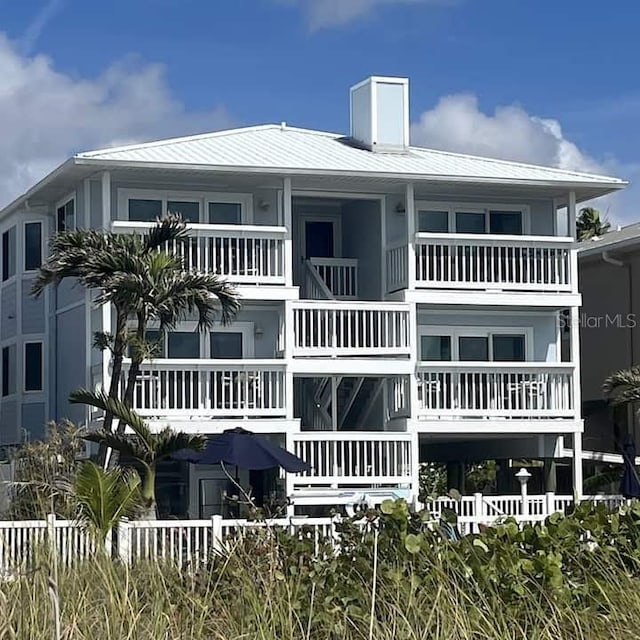 view of building exterior featuring a fenced front yard