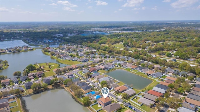 aerial view featuring a residential view and a water view