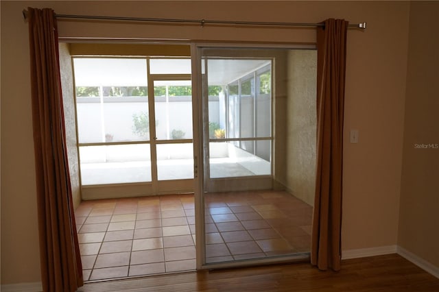 19432 Haskell Pl, Land O Lakes, FL 34638 - doorway featuring healthy amount of natural light