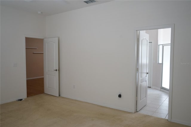 19432 Haskell Pl, Land O Lakes, FL 34638 - unfurnished room with light carpet and baseboards