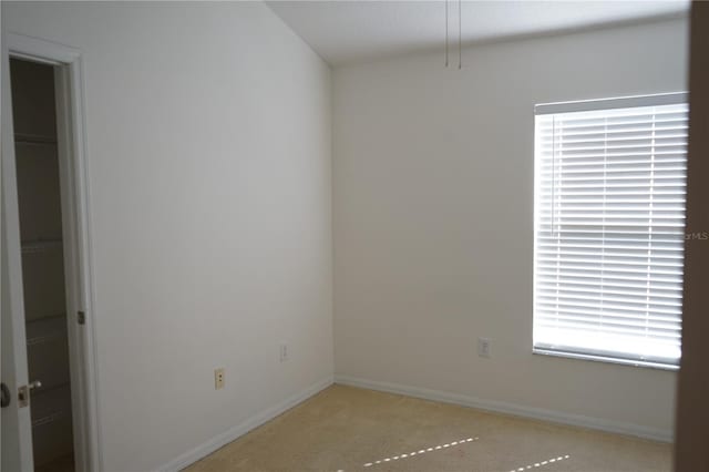 19432 Haskell Pl, Land O Lakes, FL 34638 - empty room featuring light colored carpet and baseboards