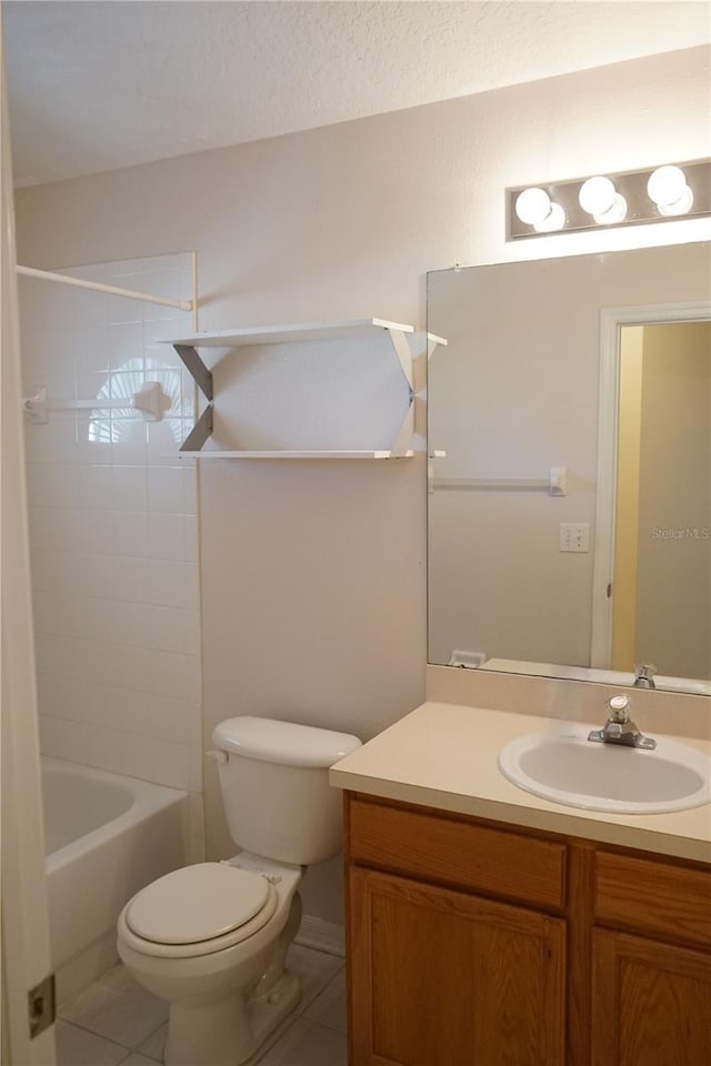 19432 Haskell Pl, Land O Lakes, FL 34638 - bathroom with tile patterned floors, vanity, and  shower combination