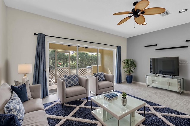 living room featuring ceiling fan, recessed lighting, wood finished floors, visible vents, and baseboards