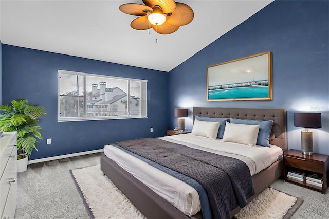 bedroom featuring lofted ceiling, carpet floors, ceiling fan, and baseboards