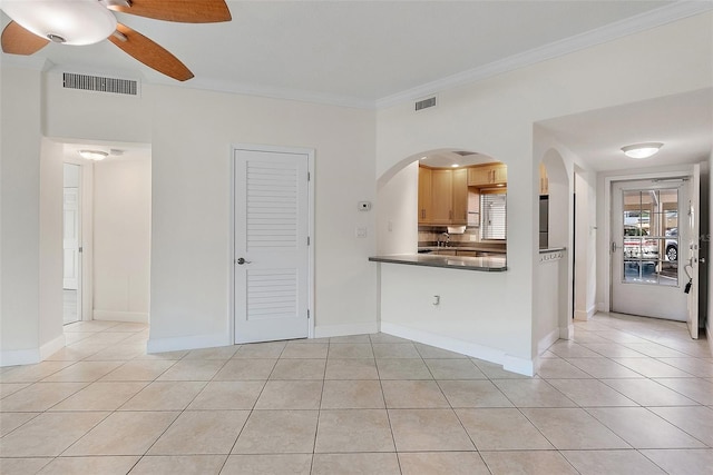 1200 N Shore Dr NE Unit 102, Saint Petersburg, FL 33701 - interior space featuring light tile patterned floors, ornamental molding, visible vents, and baseboards