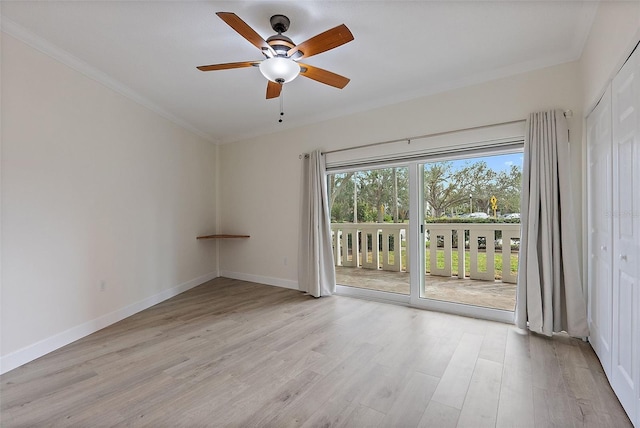 1200 N Shore Dr NE Unit 102, Saint Petersburg, FL 33701 - unfurnished room with a ceiling fan, light wood-style flooring, baseboards, and crown molding