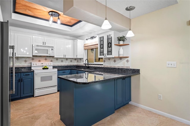 kitchen featuring blue cabinets, white appliances, white cabinets, open shelves, and a raised ceiling