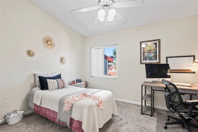 bedroom with lofted ceiling, carpet floors, a ceiling fan, and baseboards