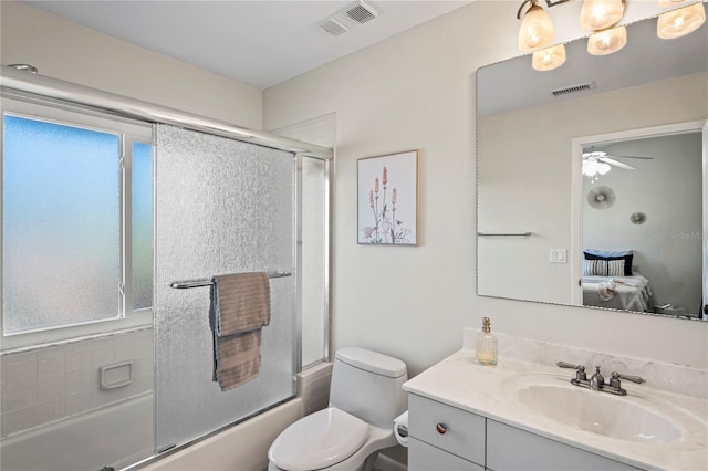 ensuite bathroom featuring ensuite bath, enclosed tub / shower combo, visible vents, and vanity