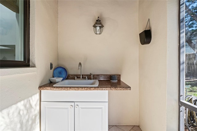 bathroom with vanity and tile patterned floors