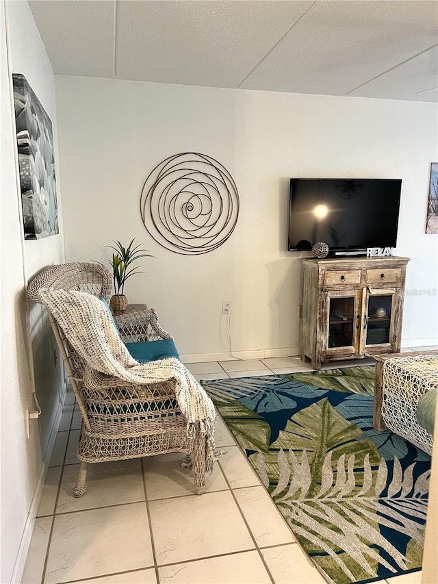 8901 Blind Pass Rd Unit 224, St Pete Beach, FL 33706 - living area featuring tile patterned floors and baseboards