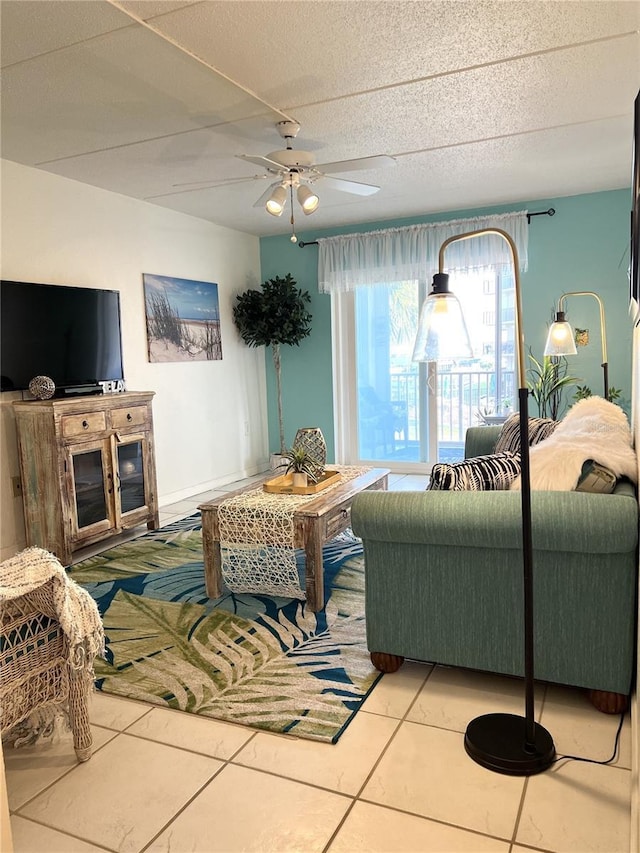 8901 Blind Pass Rd Unit 224, St Pete Beach, FL 33706 - living area featuring tile patterned flooring and ceiling fan