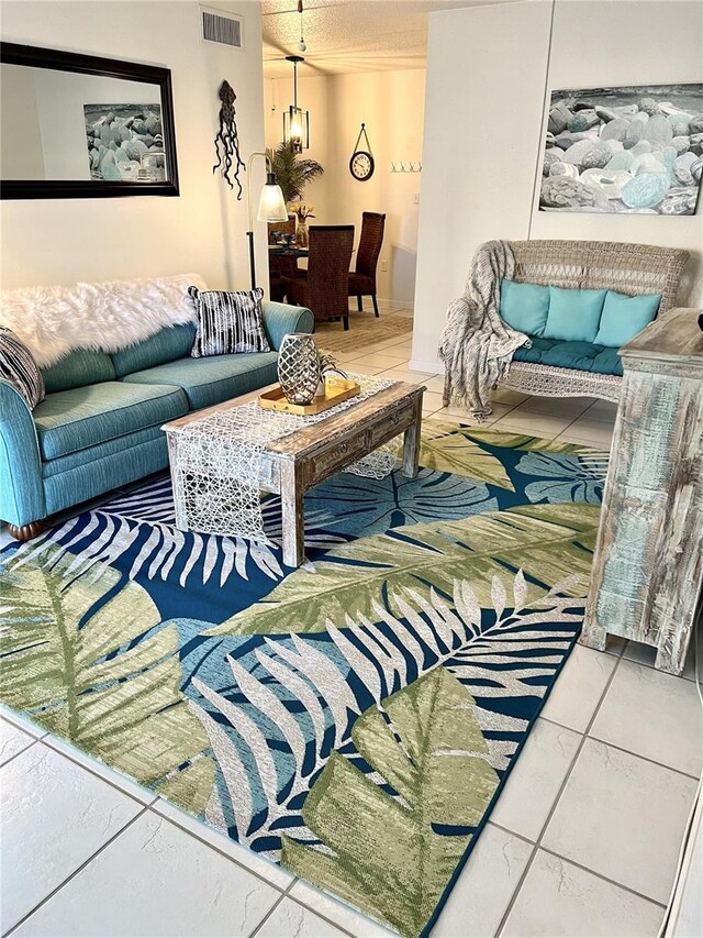 8901 Blind Pass Rd Unit 224, St Pete Beach, FL 33706 - living room with a chandelier