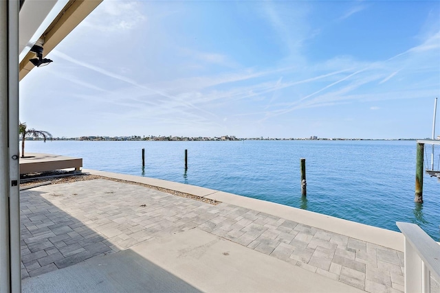 dock area with a water view