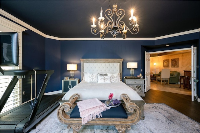 bedroom featuring wood-type flooring, a chandelier, and crown molding