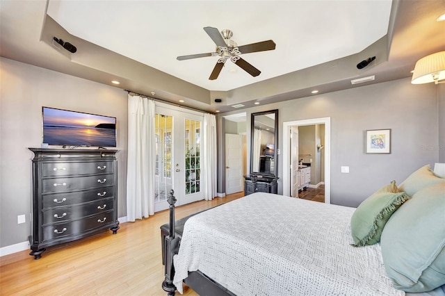 bedroom featuring light wood finished floors, baseboards, ceiling fan, access to exterior, and french doors