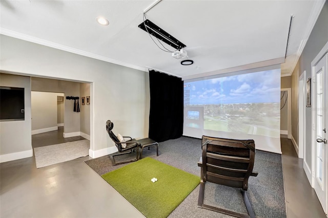 home theater room with crown molding, plenty of natural light, and baseboards