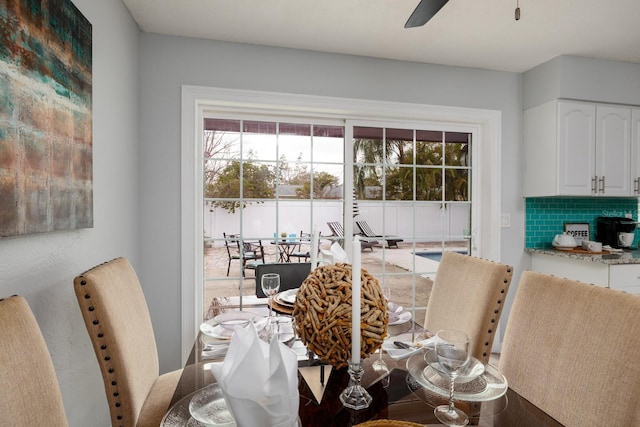 dining area featuring ceiling fan