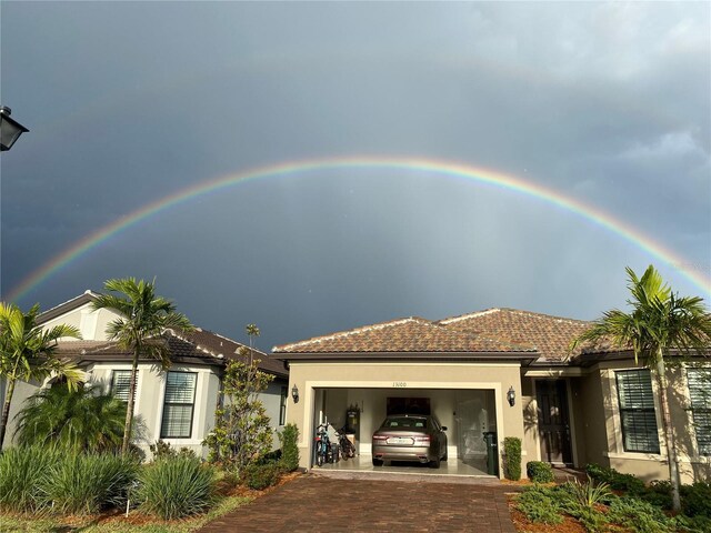 view of front of property with a garage