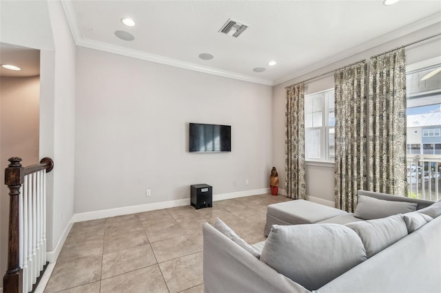 living room featuring ornamental molding and light tile patterned floors