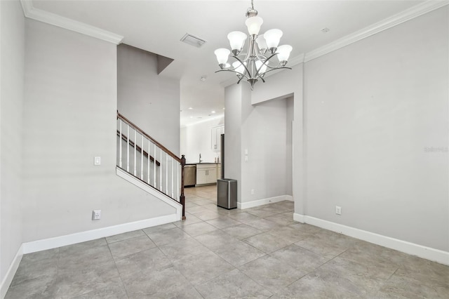 foyer entrance featuring ornamental molding and a notable chandelier